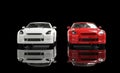 White and Red Car on Black Background - Front View Royalty Free Stock Photo