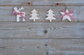 White red christmas decoration as christmas tree, reindeer and star on a old grey wooden planks background with empty copy space Royalty Free Stock Photo