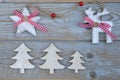 White red christmas decoration as christmas tree, reindeer and star on a old grey wooden planks background with empty copy space Royalty Free Stock Photo