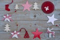 White red christmas decoration as christmas tree, reindeer and star on a old grey wooden planks background with empty copy space Royalty Free Stock Photo