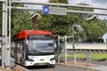 White and red city bus runned by EBS in Zoetermeer