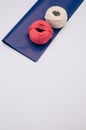 white and red decorative yarn balls on blue paper with stationery Royalty Free Stock Photo