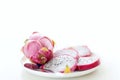 White and red dragonfruit in withe plate and spoon Royalty Free Stock Photo