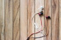 White and red earphones on wooden background Royalty Free Stock Photo