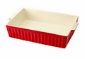 White and red enamel ceramic baking dish isolated on white Royalty Free Stock Photo