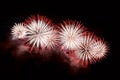 White and red fireworks display on dark sky background Royalty Free Stock Photo