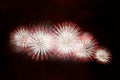 White and red fireworks display on dark sky background Royalty Free Stock Photo