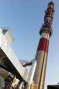 White-red industrial chimney with antennas Royalty Free Stock Photo