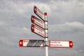 White and red letters signpost sign for cyclists to The Hague and other villages of Zuidplas