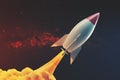White and red rocket flying in space Royalty Free Stock Photo