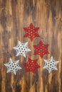 white and red shiny snowflakes decoration on wood, Christmas tree Royalty Free Stock Photo