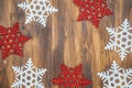 White and red shiny snowflakes decoration on wood Royalty Free Stock Photo