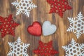 White and red shiny snowflakes and heart shape decoration on woo Royalty Free Stock Photo