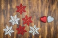 White and red shiny snowflakes and heart shape decoration on woo Royalty Free Stock Photo