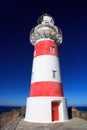 White and red striped lighthouse, location - Cape Palliser bay lighthouse, Wairarapa Royalty Free Stock Photo