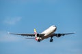 Iberia airbus a330-302 A333 with registration number EC-MAA and the landing gear lowered for landing