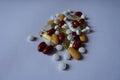 White, red, yellow and orange pills Royalty Free Stock Photo