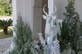 White reindeer and tree decor of Christmas at Christian wedding Royalty Free Stock Photo