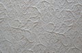 White relief patterned wallpaper Background, texture, close-up