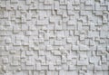 White relief tiles imitating stone on wall close Royalty Free Stock Photo