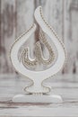 White Religious Statuette with the Name of Allah