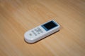 Remote Control isolated on wood. Royalty Free Stock Photo