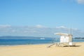 White rescue hut on a sandy beach, safe relax by the ocean, a be Royalty Free Stock Photo