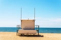 White rescue hut on a sandy beach, safe relax by the ocean, a be Royalty Free Stock Photo