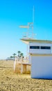 White rescue hut on a sandy beach, safe relax by the ocean, a be Royalty Free Stock Photo