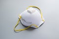 White respirator on a grey background. Mask protection coronavirus, against pollution, virus, flu