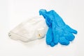 White respirators and blue nitrile medical gloves