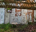 Garden location old vintage doors and white bike