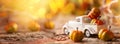 White retro truck with pumpkins in forest with festive bokeh background. Concept of Thanksgiving day, Halloween and autumn Royalty Free Stock Photo