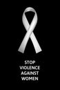 White ribbon on black background as a concept against violence against women