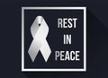 White ribbon sign and Rest in peace text in white frame on dark background