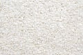 White rice background texture, long grain natural rice, jasmine rice close-up Royalty Free Stock Photo