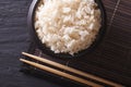 White rice in a black bowl. horiozntal top view Royalty Free Stock Photo