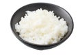 White rice in black bowl isolated on white background Royalty Free Stock Photo