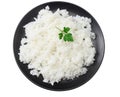 White rice in black bowl isolated on white background. top view Royalty Free Stock Photo