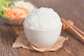 White rice in bowl with chopsticks on table. Health food. Royalty Free Stock Photo