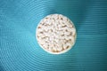 White rice crackers on blue background. Royalty Free Stock Photo