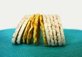 White rice crackers on blue background. Royalty Free Stock Photo