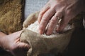 White rice in old hand Royalty Free Stock Photo