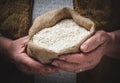 White rice in old hand Royalty Free Stock Photo