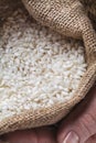 White rice in old hand Royalty Free Stock Photo