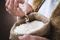 White rice in old hand Royalty Free Stock Photo