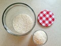 White rice in an open large glass jar