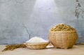 White rice or paddy rice on bamboo basket Royalty Free Stock Photo