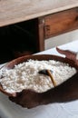 White rice serving in old rustic wooden bowl