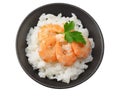 White rice with shrimps in black bowl isolated on white background. top view Royalty Free Stock Photo